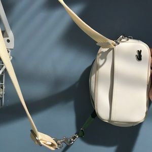 White Lacoste purse